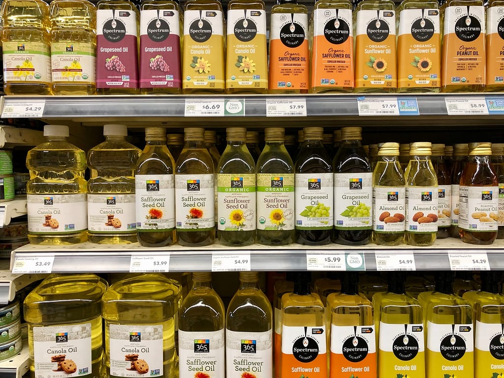 Grocery store shelf of vegetable oils