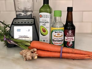 Carrot, ginger, rice vinegar, sesame oil, rice vinegar avocado oil and blender for beautifully balanced carrot ginger dressing and macro plate sauce.