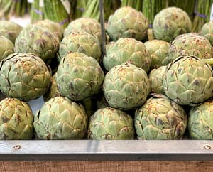 Artichokes displayed in grocery store