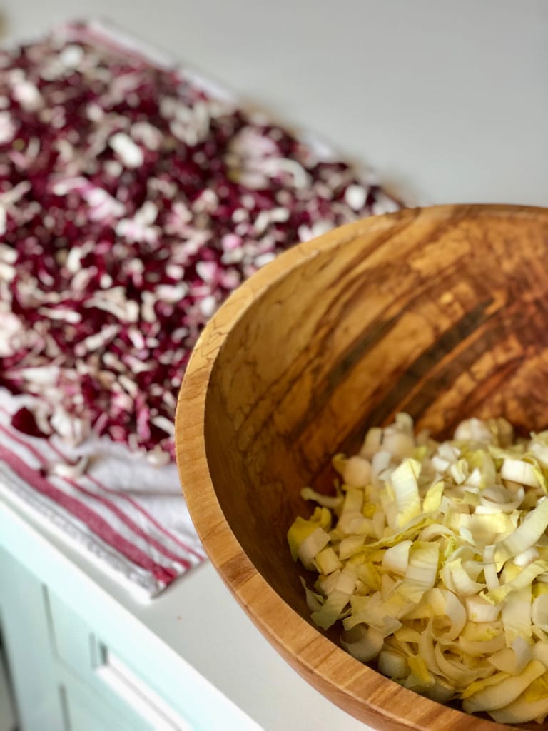 Prepping radicchio and endive for chicory salad. 