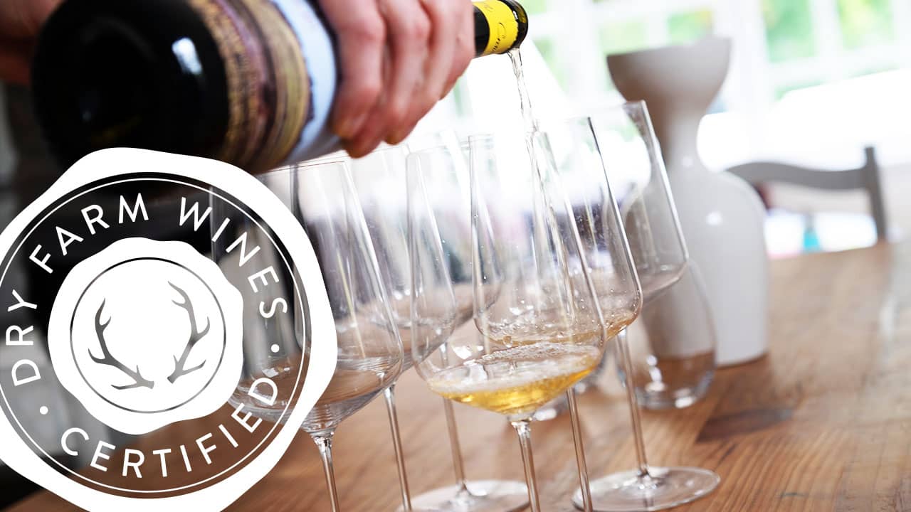 pouring natural dry farm white wine