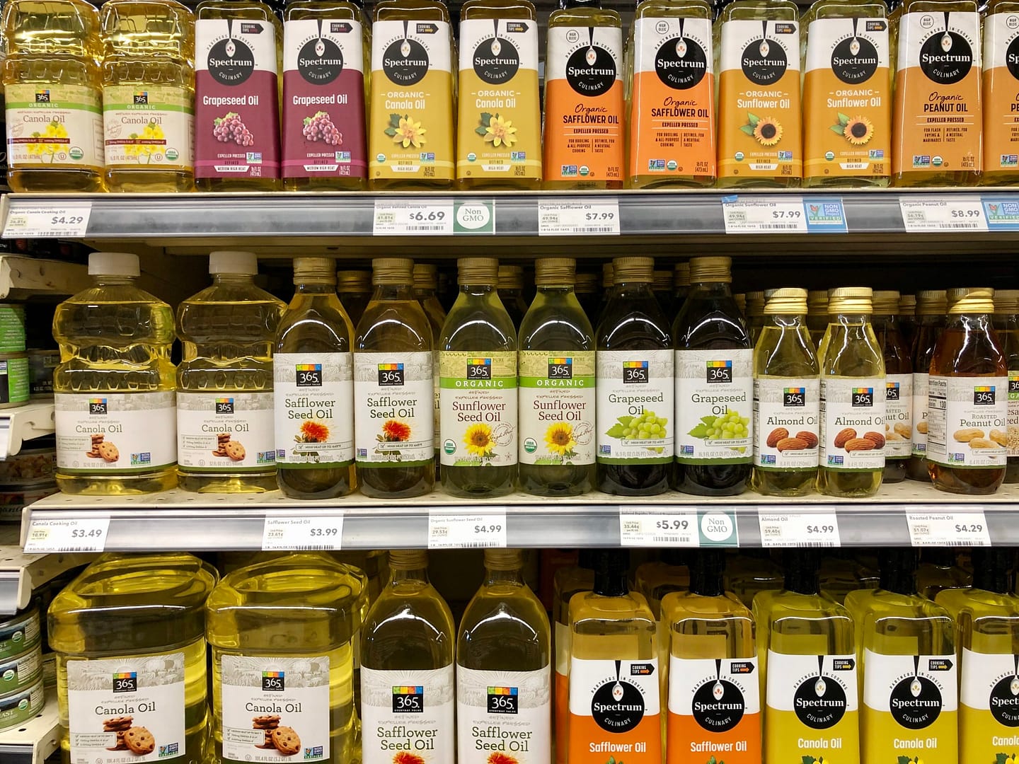 Grocery store shelf of vegetable oils